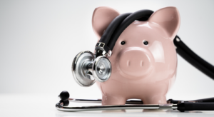 Piggy bank with a stethoscope to represent financial health